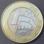 Essa moeda de R$ 1 pode valer R%$ 10 mil; Veja se você tem ela em casa.: Confira Agora 3 Essa moeda de R 1 pode valer R 10 mil