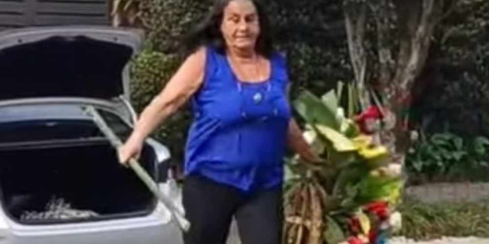 Mulher e detida ao levar coroa de flores na casa.jpg