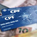 CPF e dinheiro - Créditos: depositphotos.com / Mehaniq